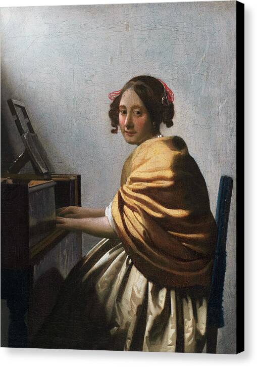 A Young Woman Seated at the Virginals - Canvas Print