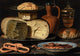 A classical still life painting depicting an assortment of food items including a large wheel of cheese, sliced brie cheese, pretzels, sliced sausage, a terracotta jug, and a goblet of amber liquid on a dark background.